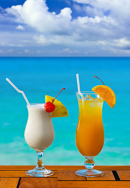 istock Two cocktails on table at beach cafe 176873804