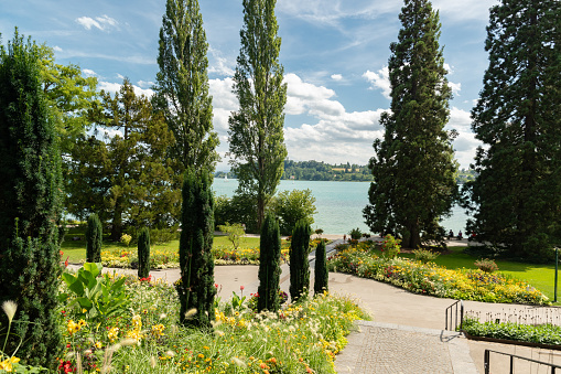 Mainau, Germany, July 20, 2023 Impressive view over the lake of Constance from a beautiful park on a sunny day