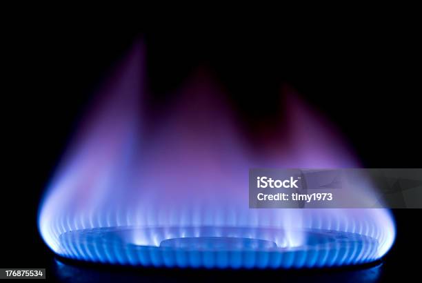 Burning On A Gas Stove In The Kitchen Stock Photo - Download Image Now - Appliance, Backgrounds, Baking