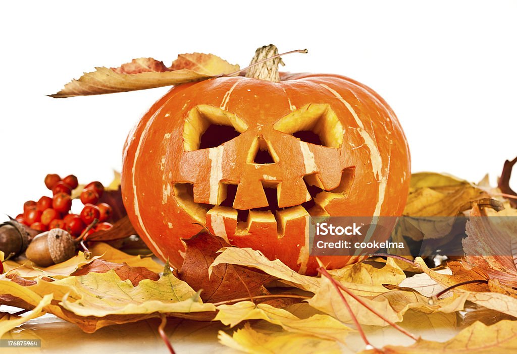 halloween, old jack-o-lantern on white Scary old jack-o-lantern on white background isolated. Autumn Stock Photo