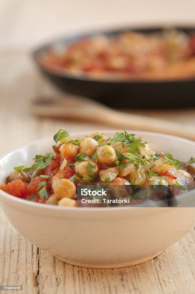 Chick pea meal Traditional vegetarian meal with chick peas and vegetables Bowl Stock Photo