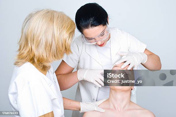 Doctor Checking Patient Woman Skin Stock Photo - Download Image Now - Dermatology, Adult, Adults Only