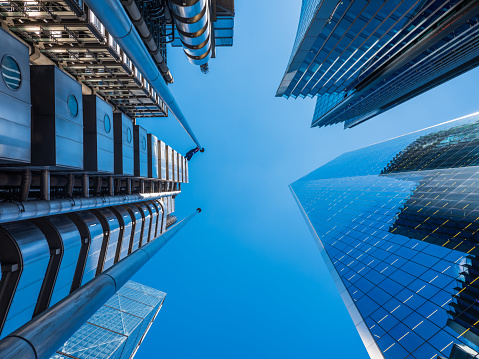 Looking up to the glass and steel skyscrapers in the heart of London’s Financial District.