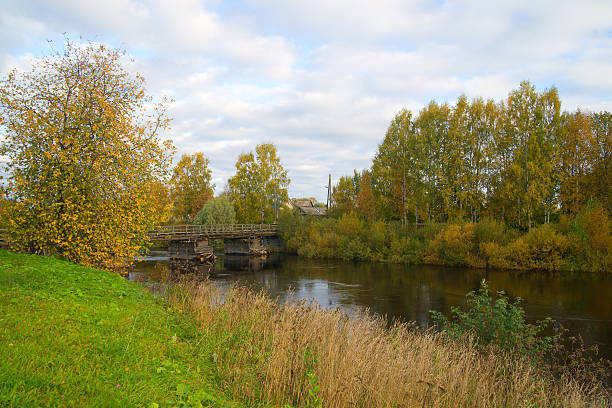 istock Autumn landscape with old wooden bridge 176876876