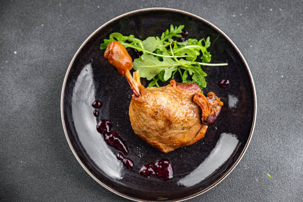 istock duck leg confit with berry sauce poultry meat second course vegetable delicious healthy eating cooking appetizer meal food snack on the table copy space 1768769116