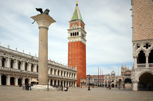 Venice, VE, Italy - May 18, 2020: Bell tower of Saint Mark in the main square without people during lockdown