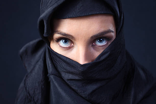 istock woman in  black 176878275