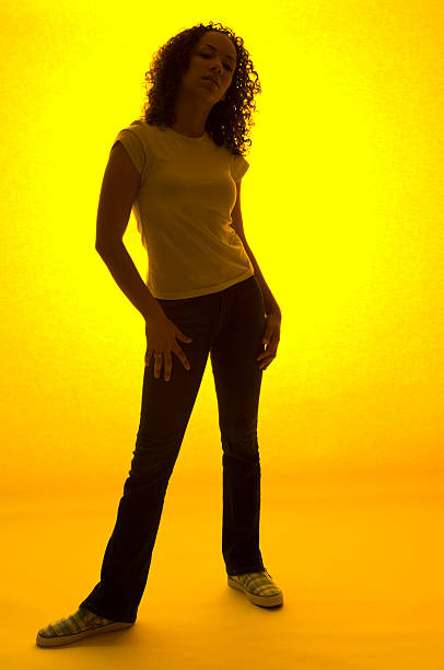 istock Woman's Yellow Silhouette with Attitude Pose 176878684