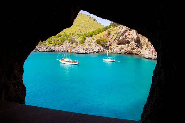 istock Escorca Sacalobra beach view from cave window 176879219