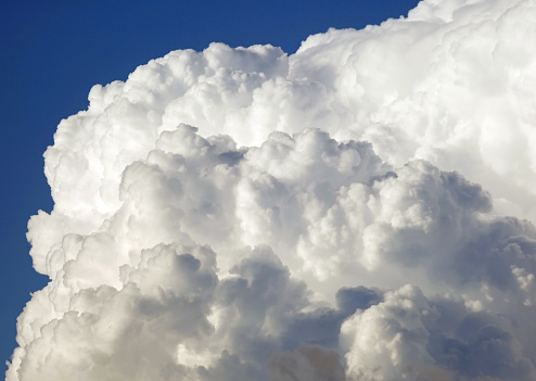 big soft white cumulonimbus cloud  and blue sky background
