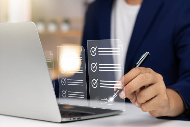 istock Efficient Electronic Signature Concept, Businessman using stylus pen signs electronic documents on digital documents on virtual tablet. Signing electronic documents for paperless transactions. 1768796589