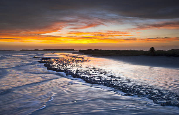 Folly Beach Ocean Sunset Charleston SC South Carolina Seascape Landscape stock photo