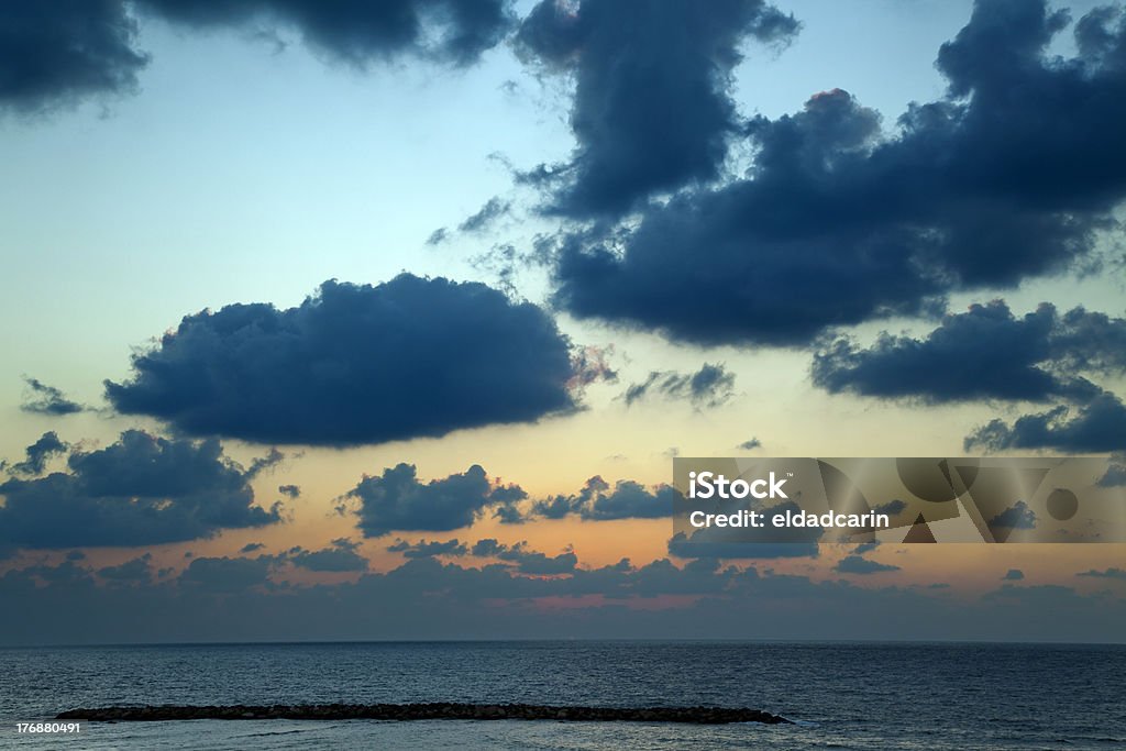 Puesta de sol sobre el mar - Foto de stock de Agua libre de derechos