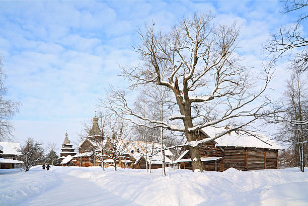 istock wooden chapel in winter village 176880854