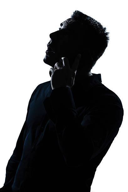 istock silhouette man portrait  telephone surprised 176881962