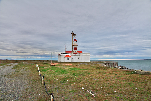 Magellanic Strait, Chile - 21 Dec 2019: The lighthouse on Magellanic Strait, Tierra del Fuego, Chile