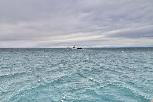 Magellanic Strait, Chile - 21 Dec 2019: The ferry on Magellanic Strait, Tierra del Fuego, Chile