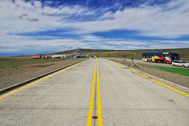 The border between Argentina and Chile in Tierra del Fuego Tierra del Fuego - 21 Dec 2019: The border between Argentina and Chile in Tierra del Fuego chile argentina punta arenas magellan penguin stock pictures, royalty-free photos & images