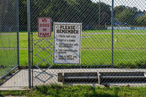 Veira Park,  Oak Bluffs, Martha's Vineyard.  Sign to warn parents against inappropriate behaviour at Softball games.