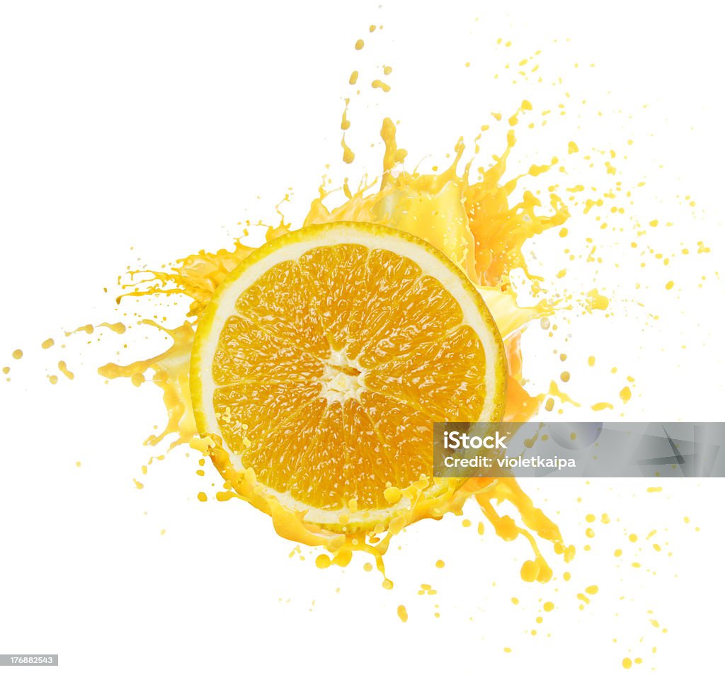 Orange juice splashing Splashing Stock Photo