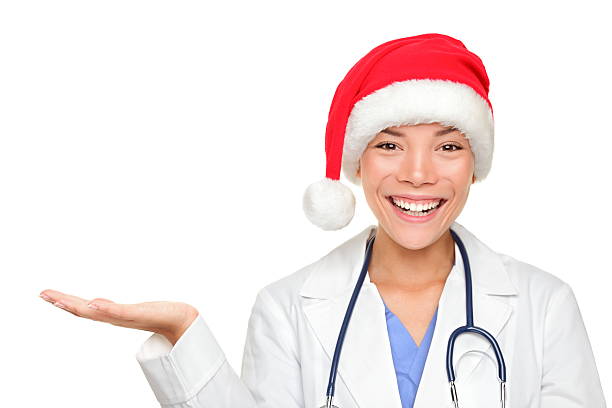 istock Christmas doctor showing holding hand palm open 176882763