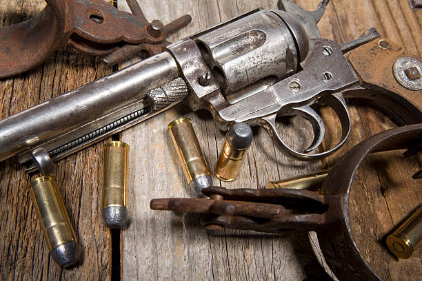 istock Antique Pistol With Bullets and Spurs 176883113