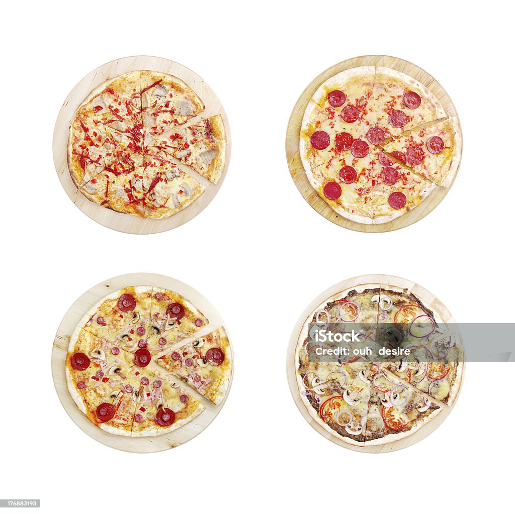 Cuatro pizzas aislado sobre un blanco. - Foto de stock de Cuatro objetos libre de derechos