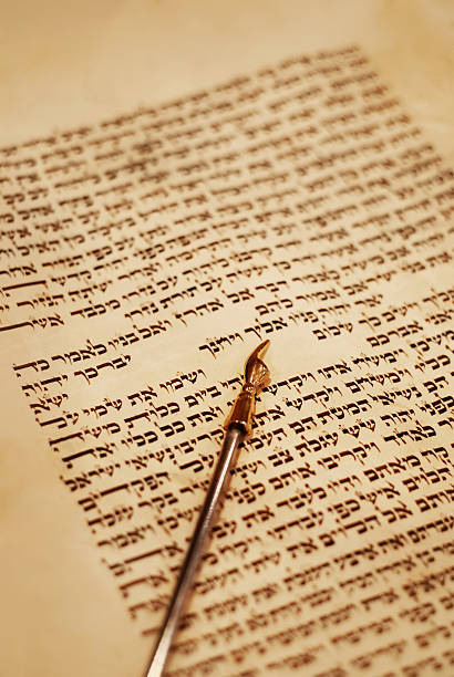 Torah and Yad Pointer Torah scroll with a yad pointer showing Numbers 6:24-26 (known as the Aaronic blessing) simchat torah photos stock pictures, royalty-free photos & images
