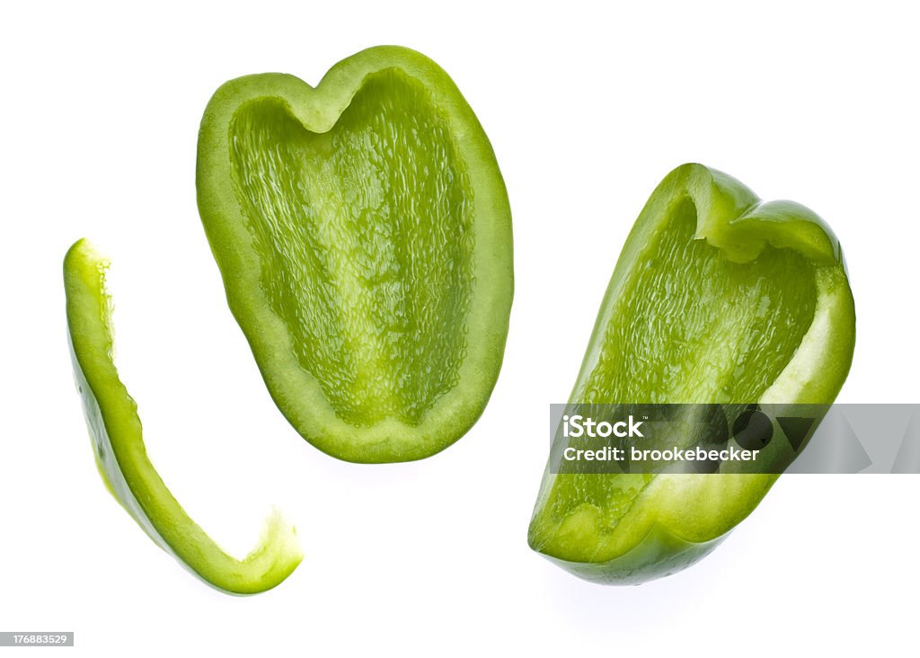 Fresh Green Bell Pepper Slices Fresh Green Bell Pepper Slices Isolated on White with a Clipping Path. Bell Pepper Stock Photo
