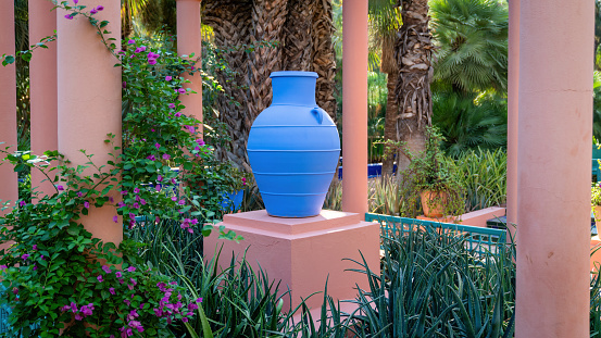 Marrakech, Morocco - 16 September 2022: Blue vase inside the Majorelle Garden of Yves Saint Laurent, Casa Oasis, a botanical garden designed by Yves Saint Laurent