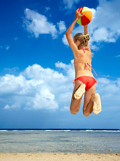 istock Child playing on beach with ball. 176883564
