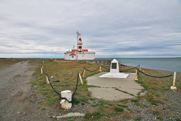 The lighthouse on Magellanic Strait, Tierra del Fuego, Chile Magellanic Strait, Chile - 21 Dec 2019: The lighthouse on Magellanic Strait, Tierra del Fuego, Chile chile argentina punta arenas magellan penguin stock pictures, royalty-free photos & images