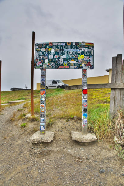 The info plate on Magellanic Strait, Tierra del Fuego, Chile Magellanic Strait, Chile - 21 Dec 2019: The info plate on Magellanic Strait, Tierra del Fuego, Chile chile argentina punta arenas magellan penguin stock pictures, royalty-free photos & images