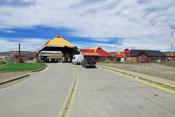 The border between Argentina and Chile in Tierra del Fuego Tierra del Fuego - 21 Dec 2019: The border between Argentina and Chile in Tierra del Fuego chile argentina punta arenas magellan penguin stock pictures, royalty-free photos & images