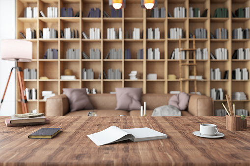 Cozy Library Workspace with Wooden Table and Books. 3D Render