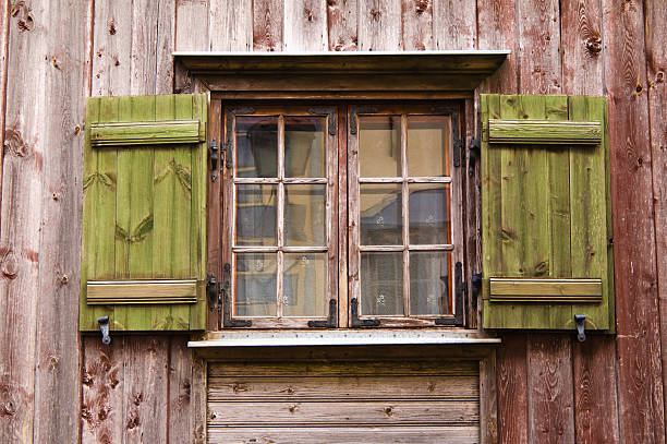 istock Old wooden window with shutters 176884784