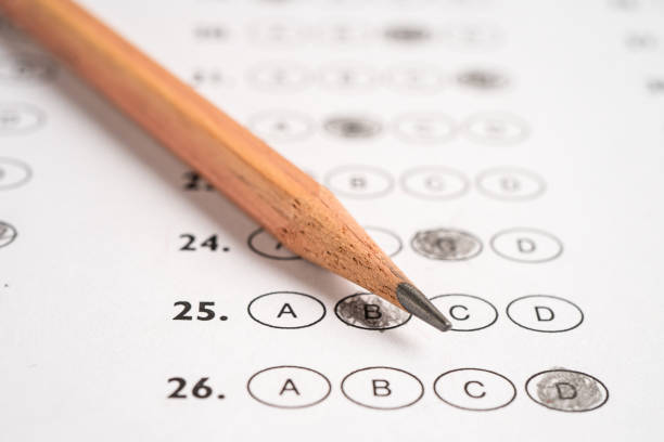 istock Answer sheets with pencil drawing fill to select choice, education concept. 1768848719