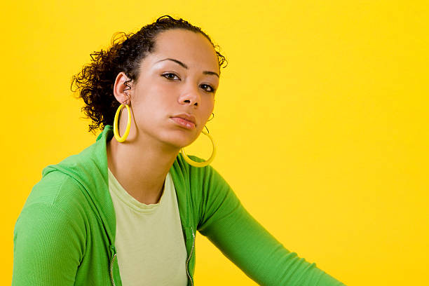 istock Mixed Race Woman With Attitude (Yellow Background) 176885287