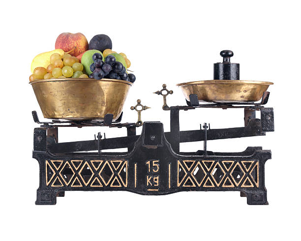 istock Old-fashioned balance scale with fruits, isolated on white background 176885433