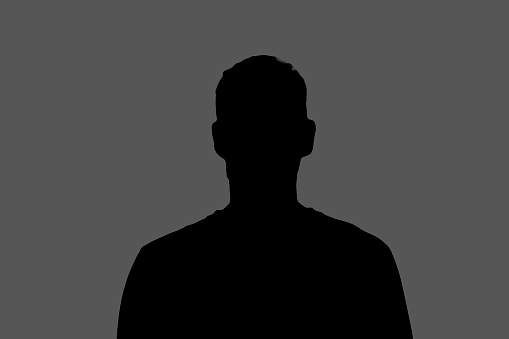 dark backlight shadow silhouette of male person, incognito unknown profile