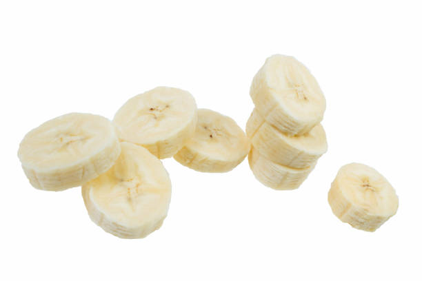 istock Flying banana slices, isolated on white background. 1768861372
