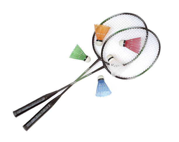 istock Badminton racquets with color shuttlecocks over white 176886968