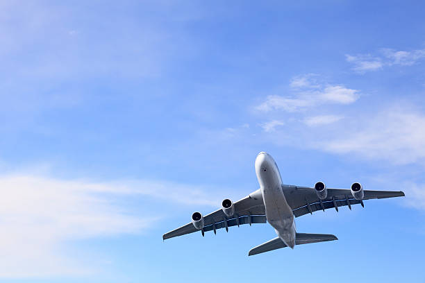 istock Commercial Aircraft Taking off into Bright Summer Sky Superjumbo 176887039