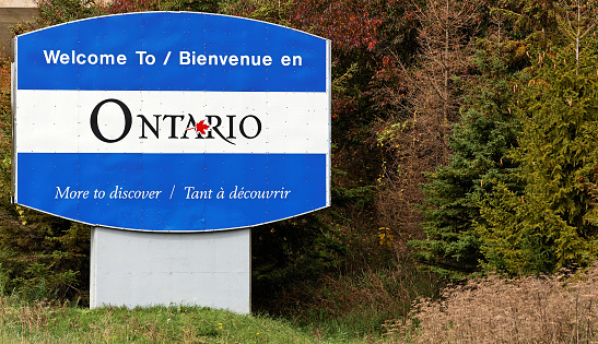 A welcome sign at the entrance to the Ontario province of Canada.