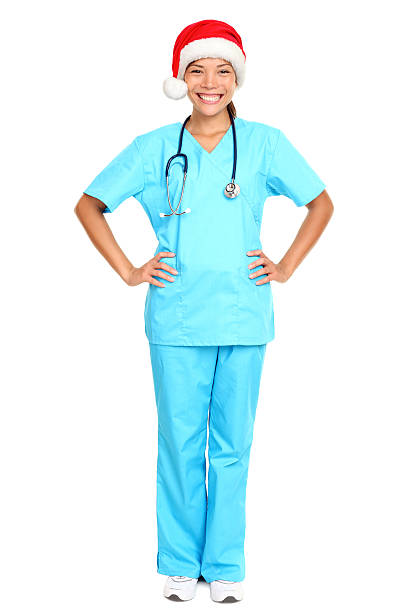 istock nurse wearing christmas santa hat 176888606