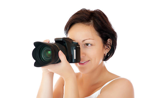 istock Young girl with DSLR 176889154