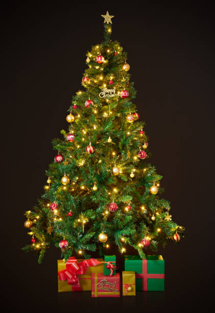 istock Beautifully decorated Christmas tree on a black background 1768893307