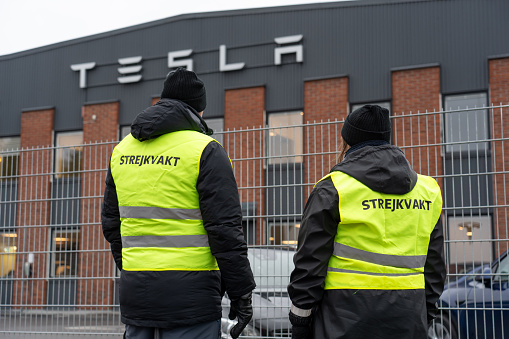 Representatives fron Swedish workers union organisation IF Metall are on site at a Tesla service center in Segeltorp, south of Stockholm, on the first day of a nation-wide strike against the company. The union is demanding that Tesla signs a collective agreement for its service technicians, which it so far has refused to do, with reference to the company's global anti-union policy