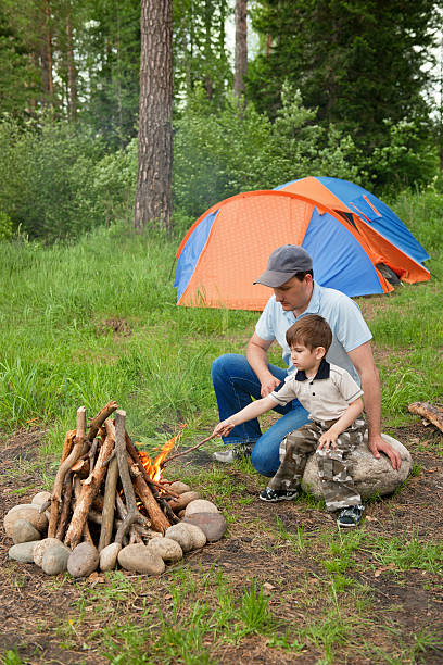 istock Father and the son at a fire 176891269