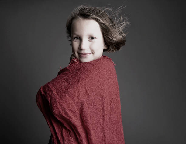 Blond girl acting as superhero